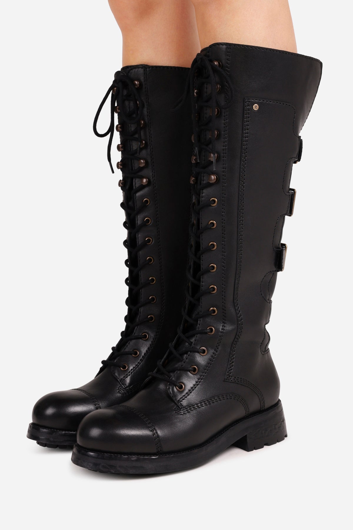 strick-er | black