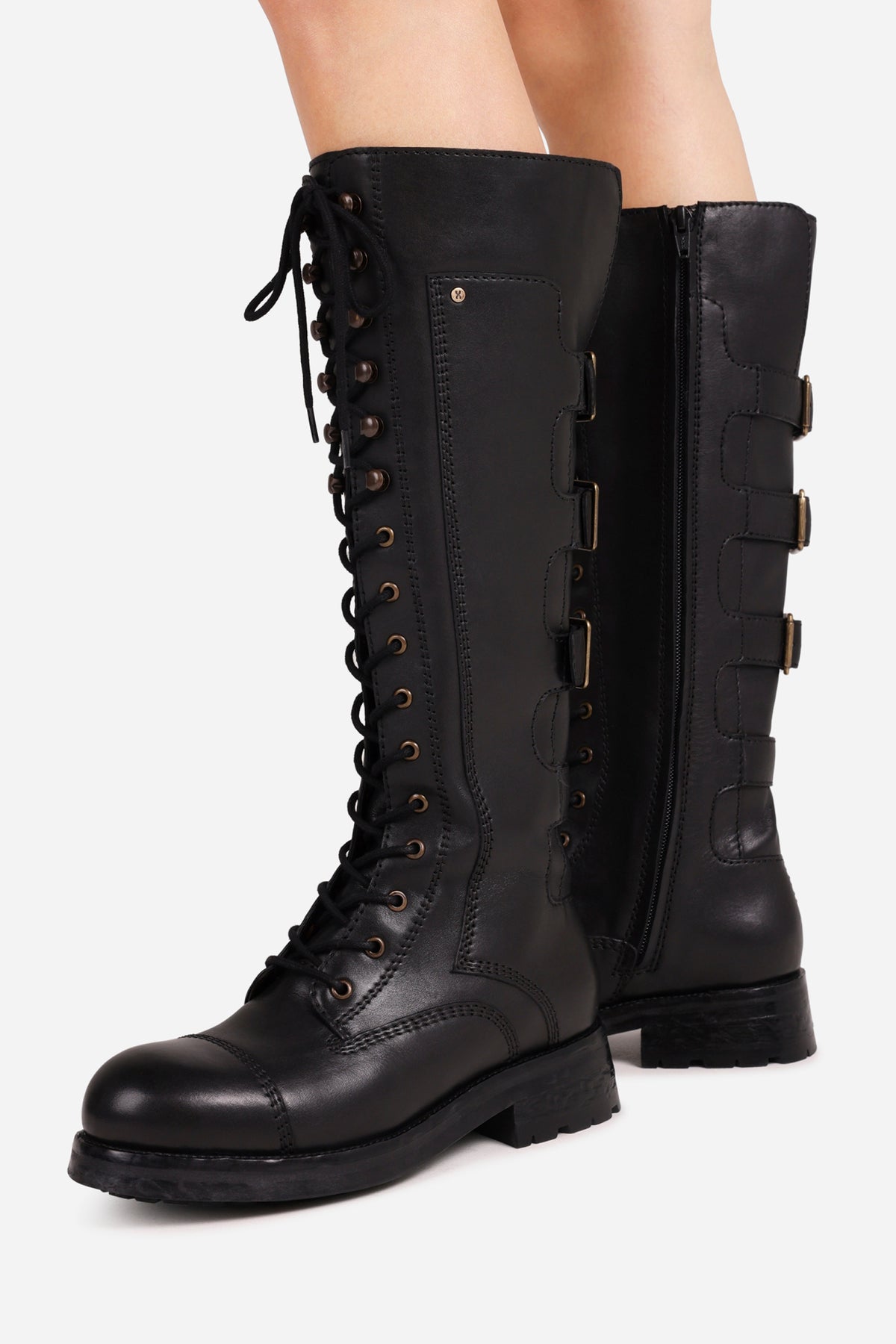 strick-er | black
