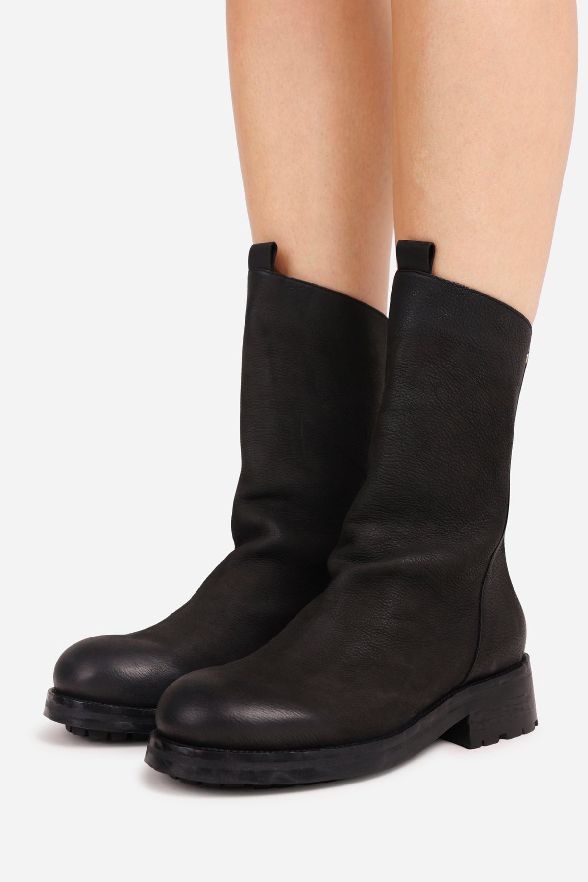 strick-er | black