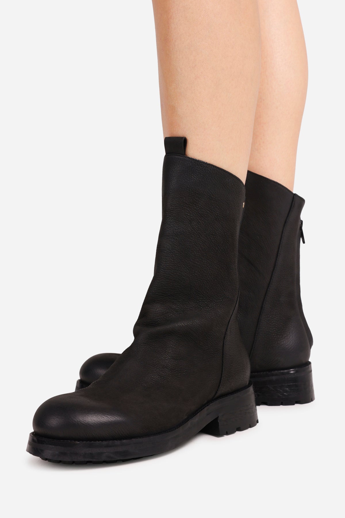 strick-er | black