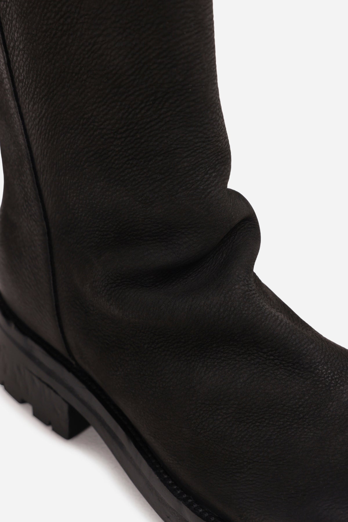 strick-er | black